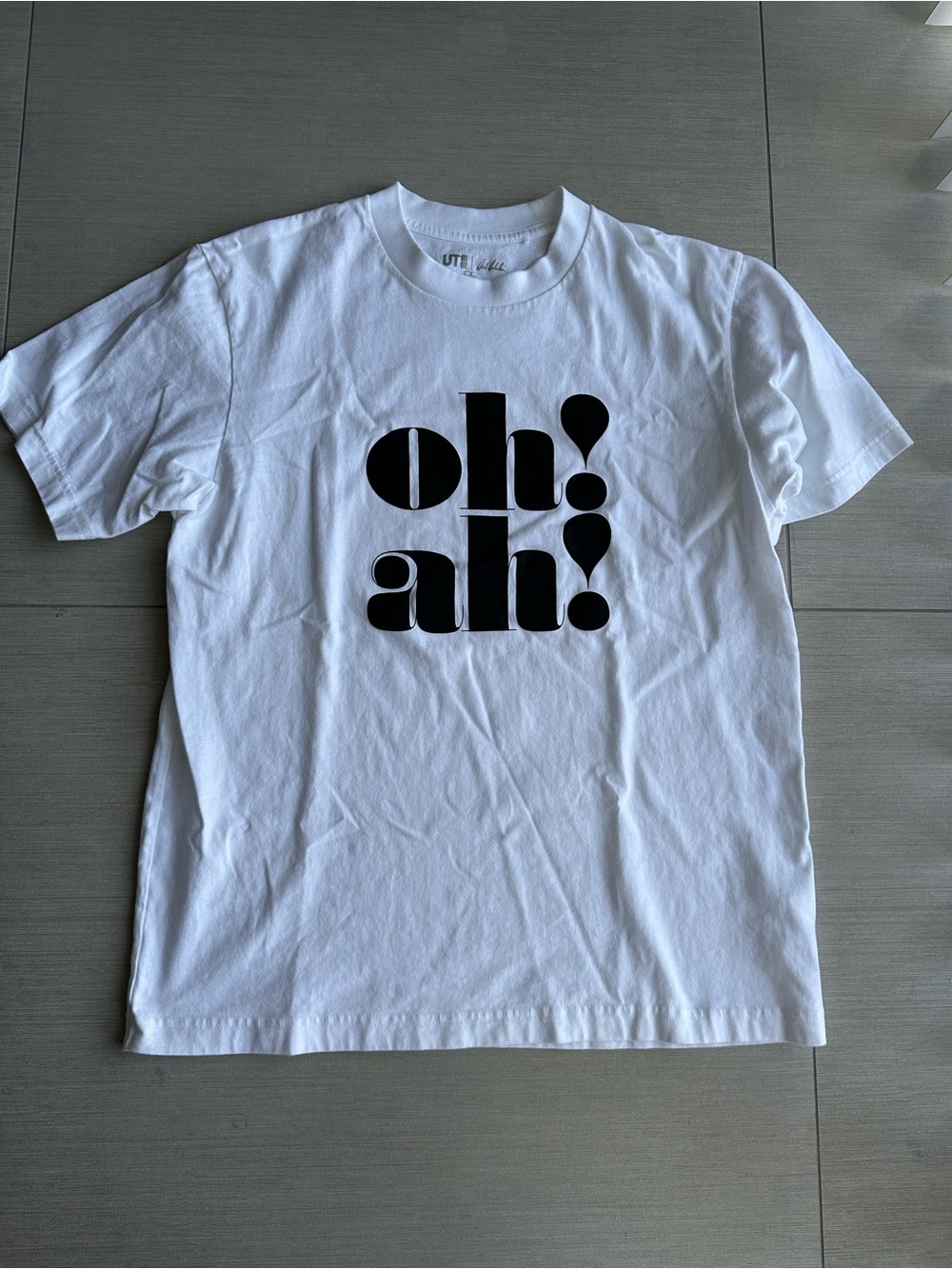 Uniqlo White Short Sleeve Tee with Black 'oh! ah!' Graphic
